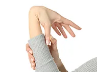 women's hand bent backwards