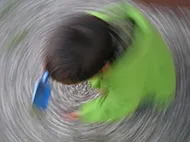 warped young boy in green shirt