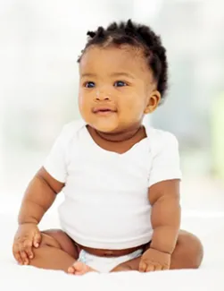 baby wearing a white tshirt and diaper